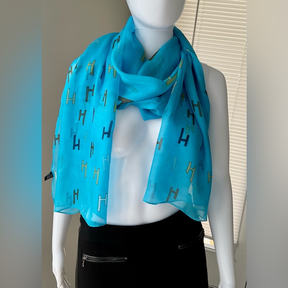 Women's blue scarf with letter H monogram. Used. Excellent condition. Smoke free